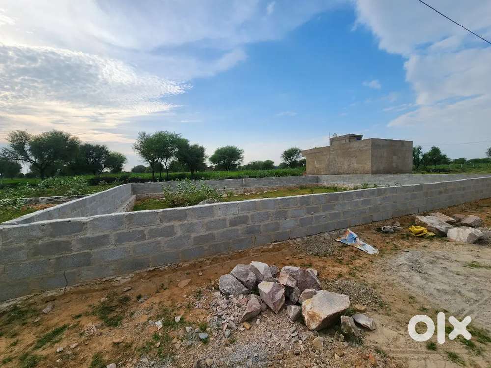 Plot with boudanry  and nearby oswal logipark