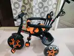 Bycycle for sale in new condition orange colour 1 to 5 years old