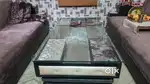 PINK SOFA SET WITH TRANSPARENT GLASS TABLE