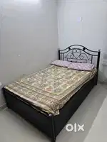 Queen size metal bed with hydraulic storage