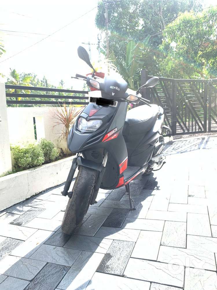 Carbon colour and Ladie used scooter