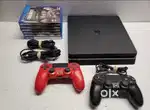 Sony PlayStation 4 1TB Console - 2 Controllers, 6 Games, Cords