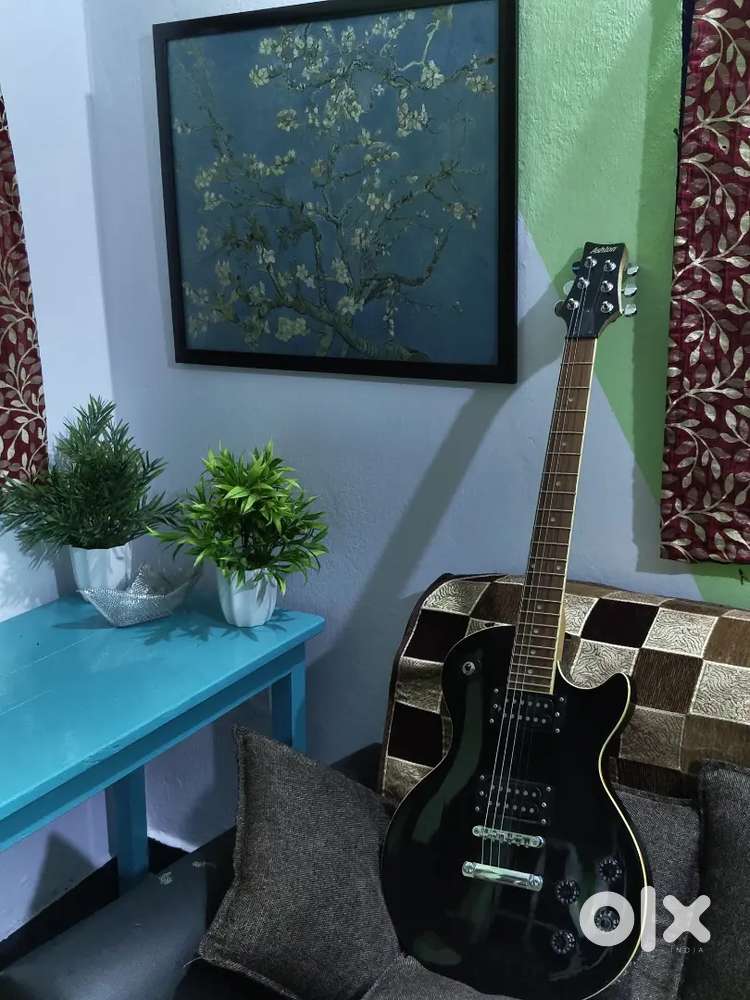 A great deal -Ashton Les Paul Model Guitar with Hertz HG-20 Amplifier