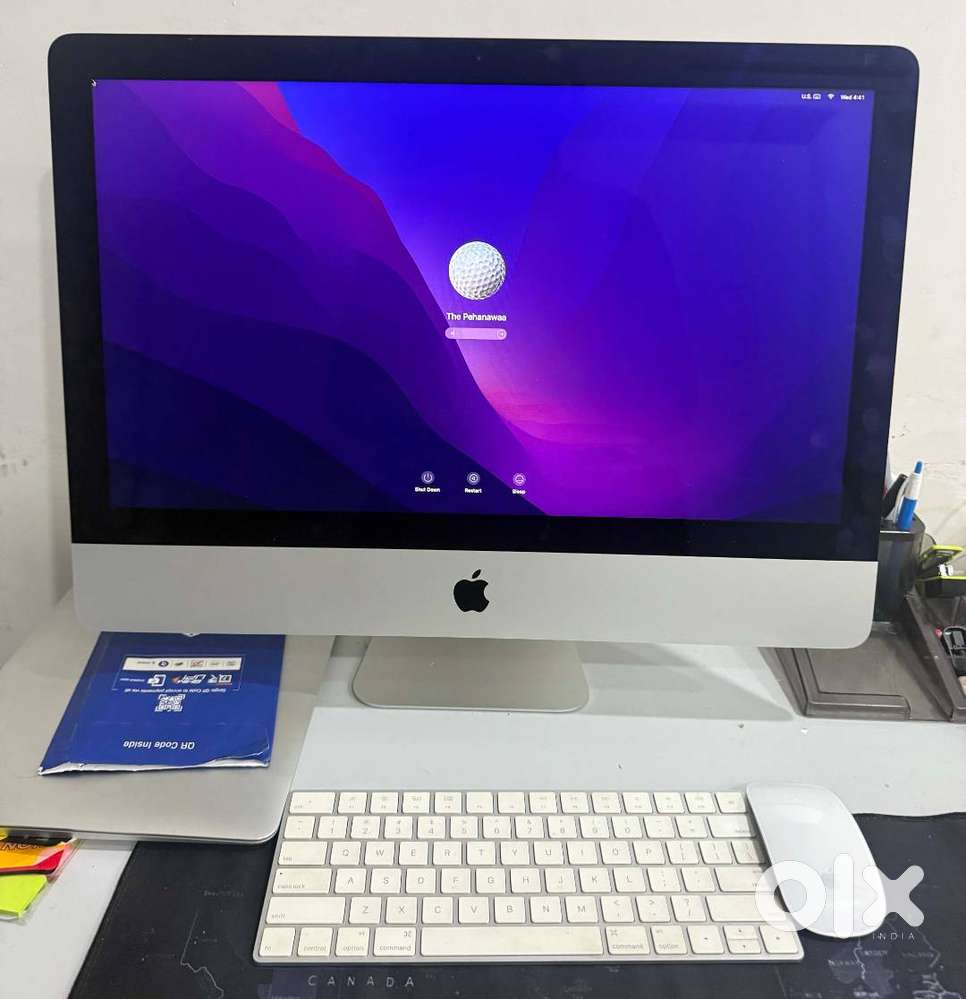 iMac (21.5-inch, Late 2015) with Magic Mouse and Keyboard.