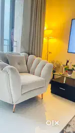 Single sofa, Center table and a lamp