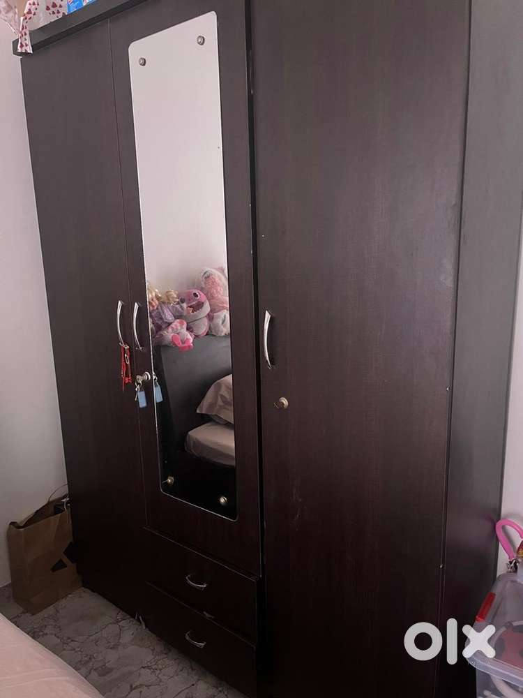 Queen size bed, wardrobe, side table