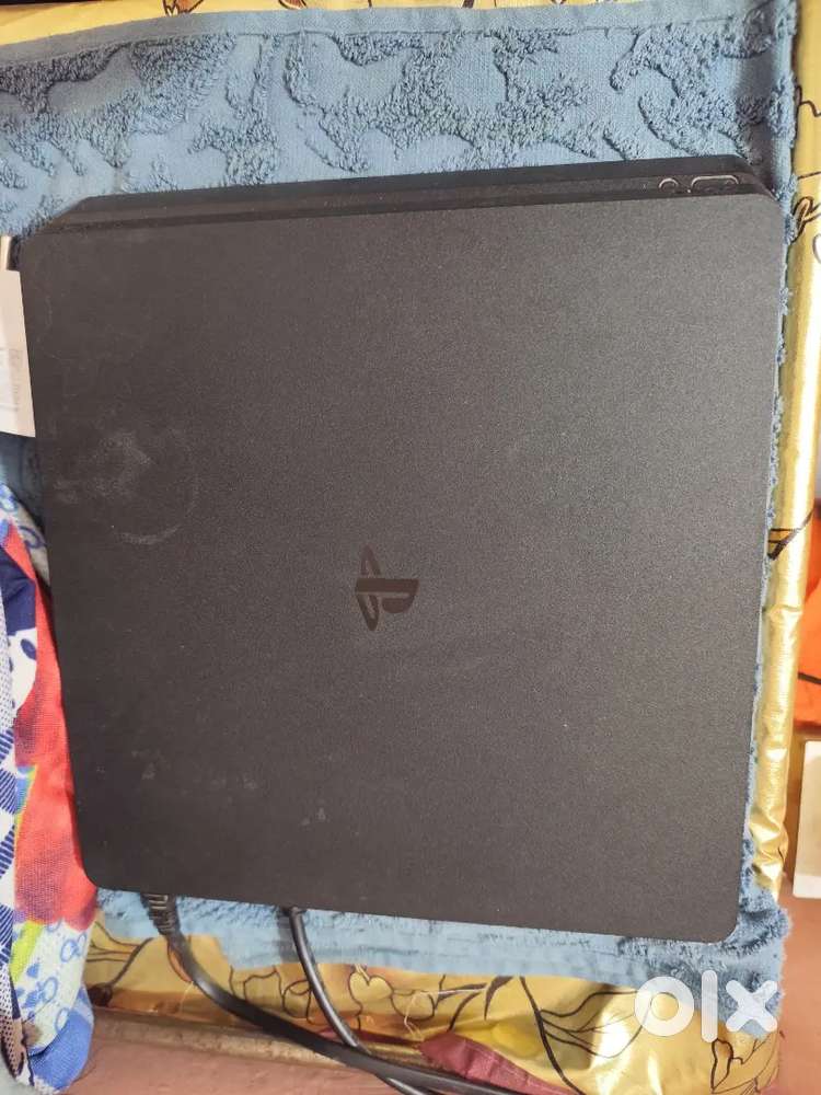 PS4 SLIM 500GB WITH ORGINAL CONTROLLER