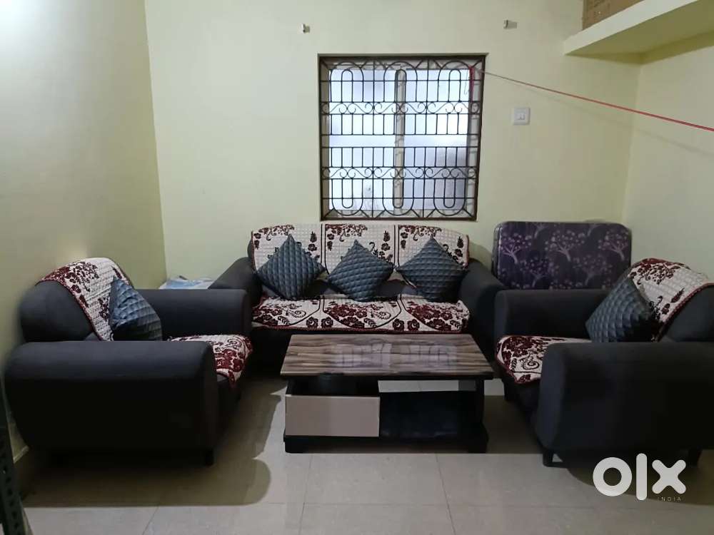 Sofa set with  teapoy and dinning table with four chairs