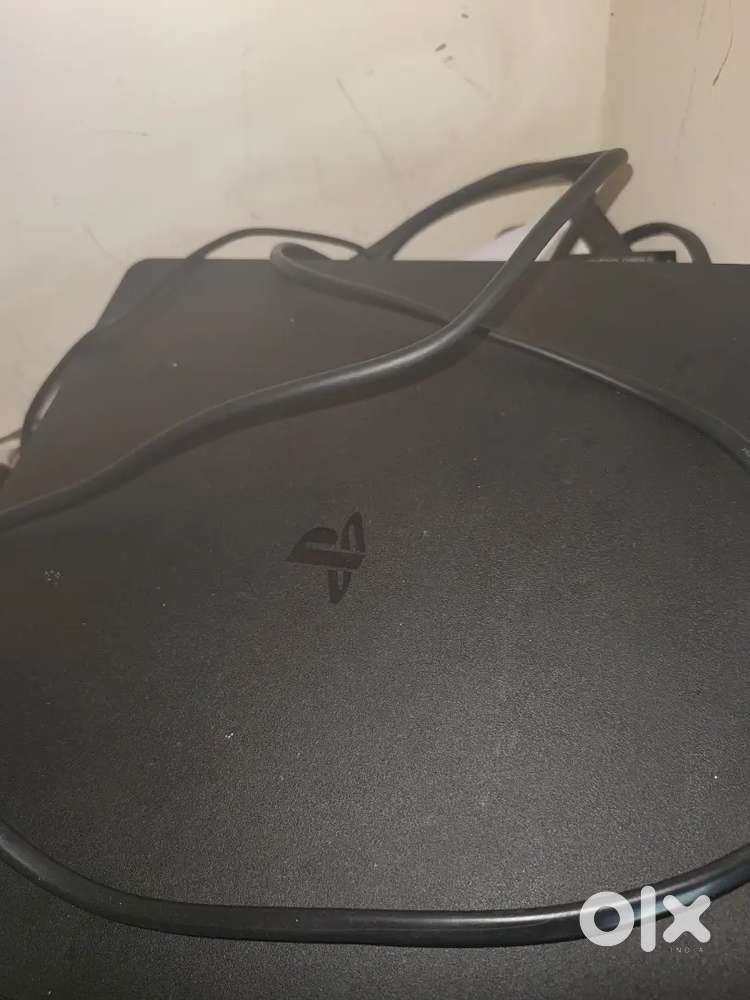 Ps 4 1tb with controller with one game cd WWE2K17