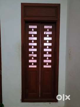 Pooja room door with kattala