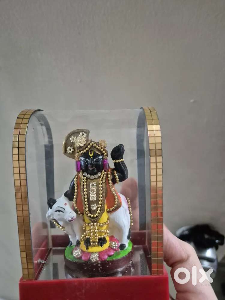 4 Religious photo frames/murtis