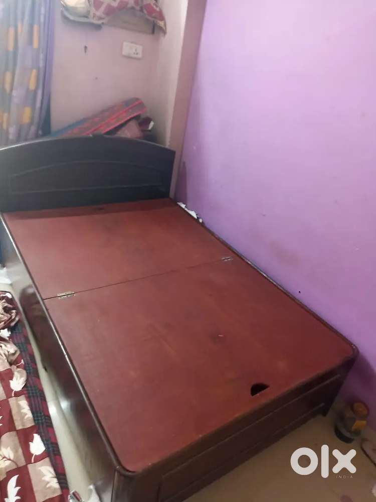 Wooden bed with storage