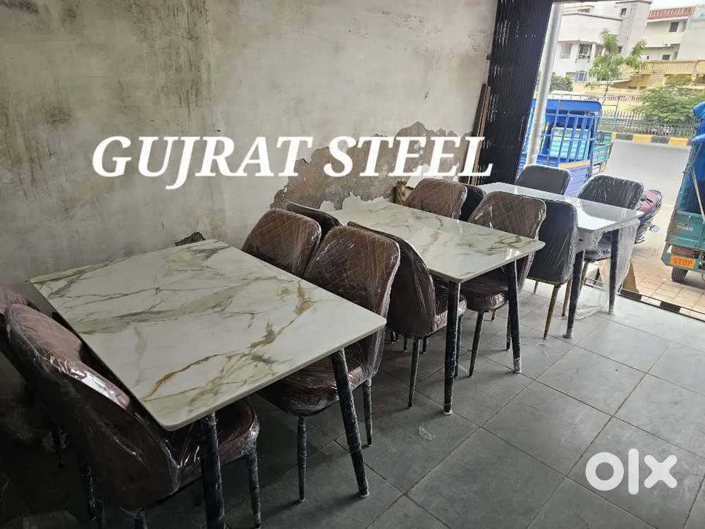 Marble top steel structure dining table