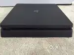 Ps4 slim 1TB with controller with 7 original game Disc