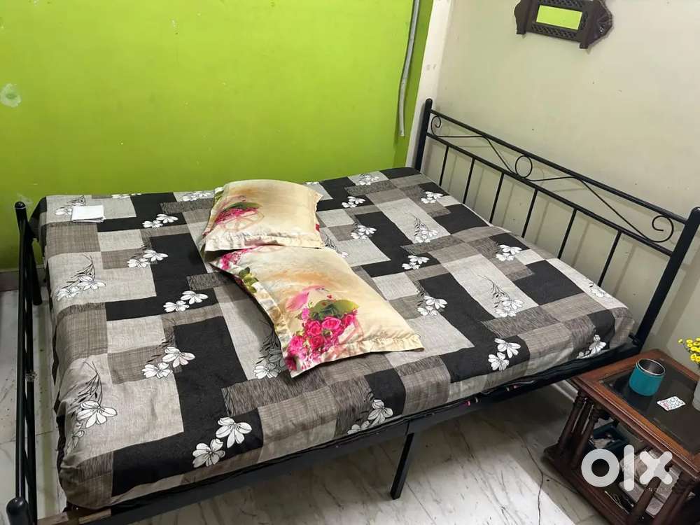 Wrought iron double bed with mattress