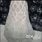 Brand new designer pink lehenga with zari work.