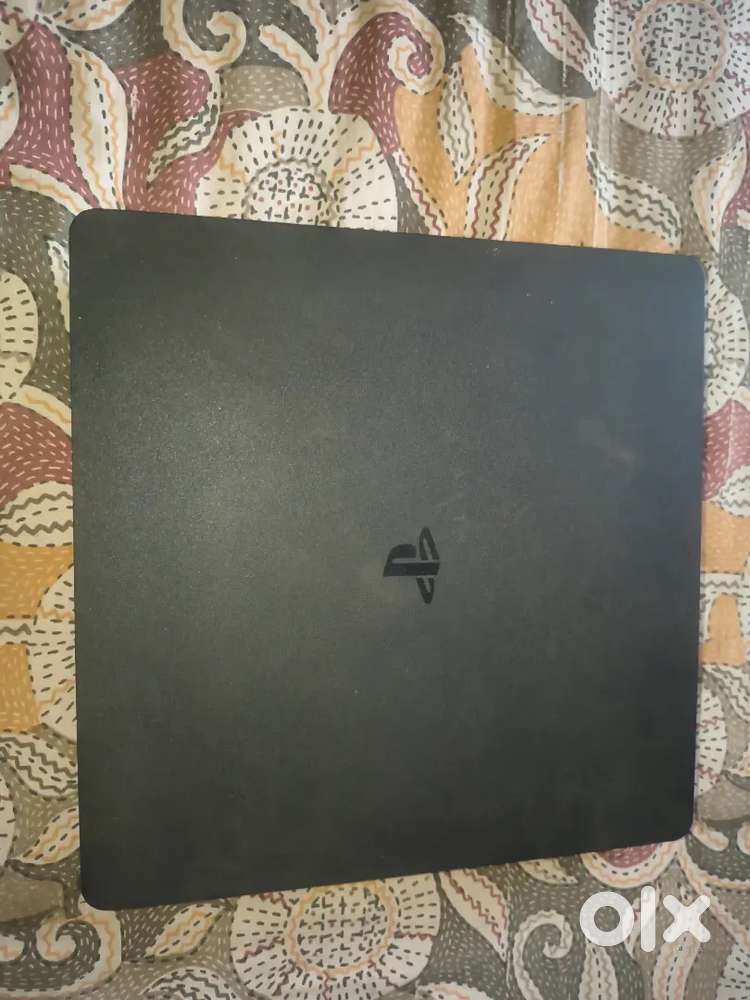 Sony PS4 (1TB HDD) with 3 Joysticks – Excellent Condition