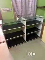 2 iron cot and 1 wooden shelf cabinet