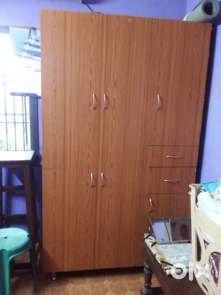 Wooden cupboard withshelves closed