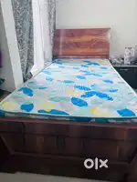 Single bed with orthopaedic mattress