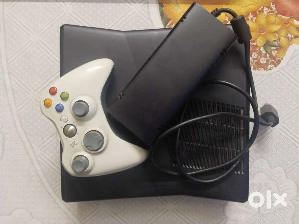 XBOX 360 with 1 wireless remote and games