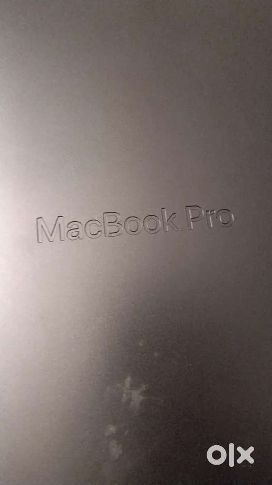 Apple laptop MacBook pro with bill box with chargers