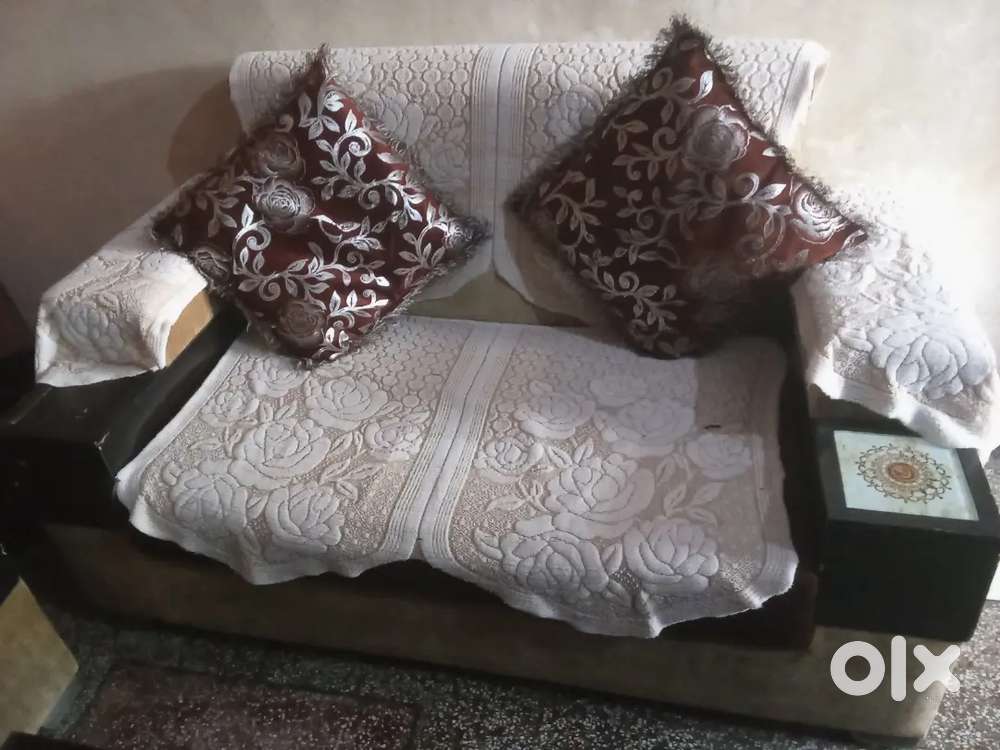 Two sitter sofa with table  saleout.