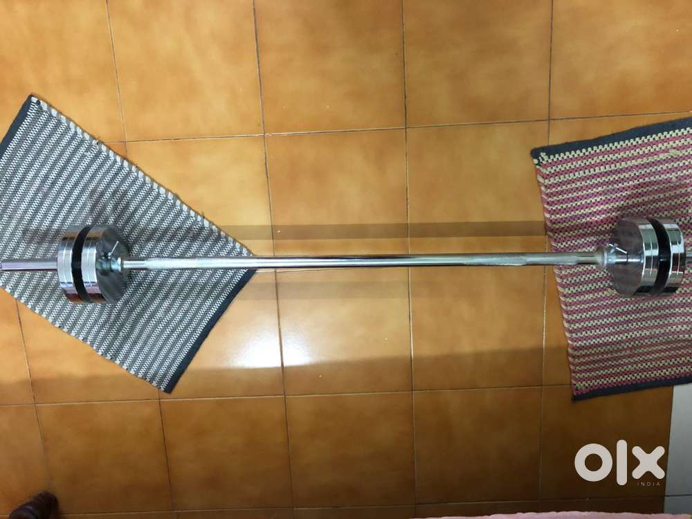 Barbell (straight steel) bar with 20 Kg weights