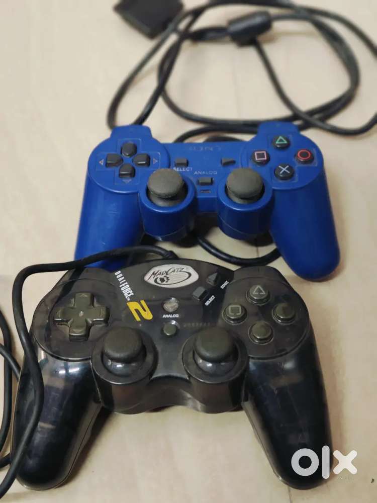 Sonu PlayStation 2 controller and mad catz controller