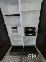 A metal Wardrobe with 2 big mirrors
