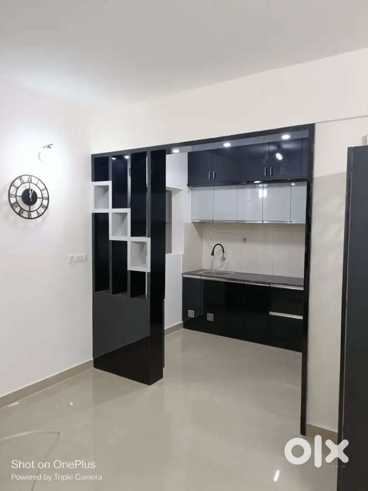 2 BHK semi furnished flat for sale with covered car parking