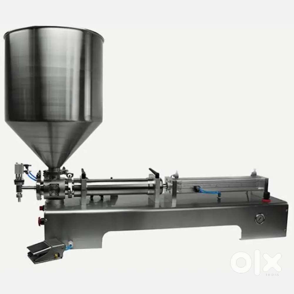 Automatic liquid filling piston filler machine