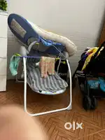 Portable rocking chair with calming music