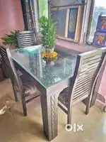 Elegant Glass-top Dining Table with Chairs