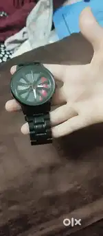 Boys wrist watch showing wheels on it