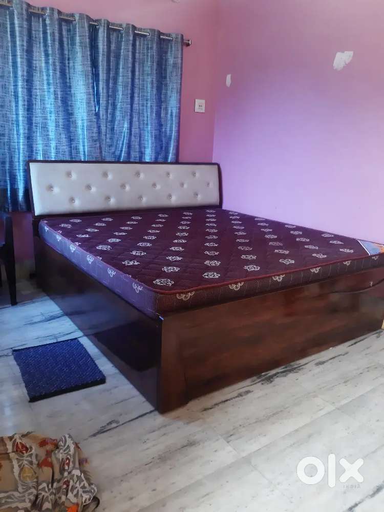 Strong wooden bed with excellent branded mattress
