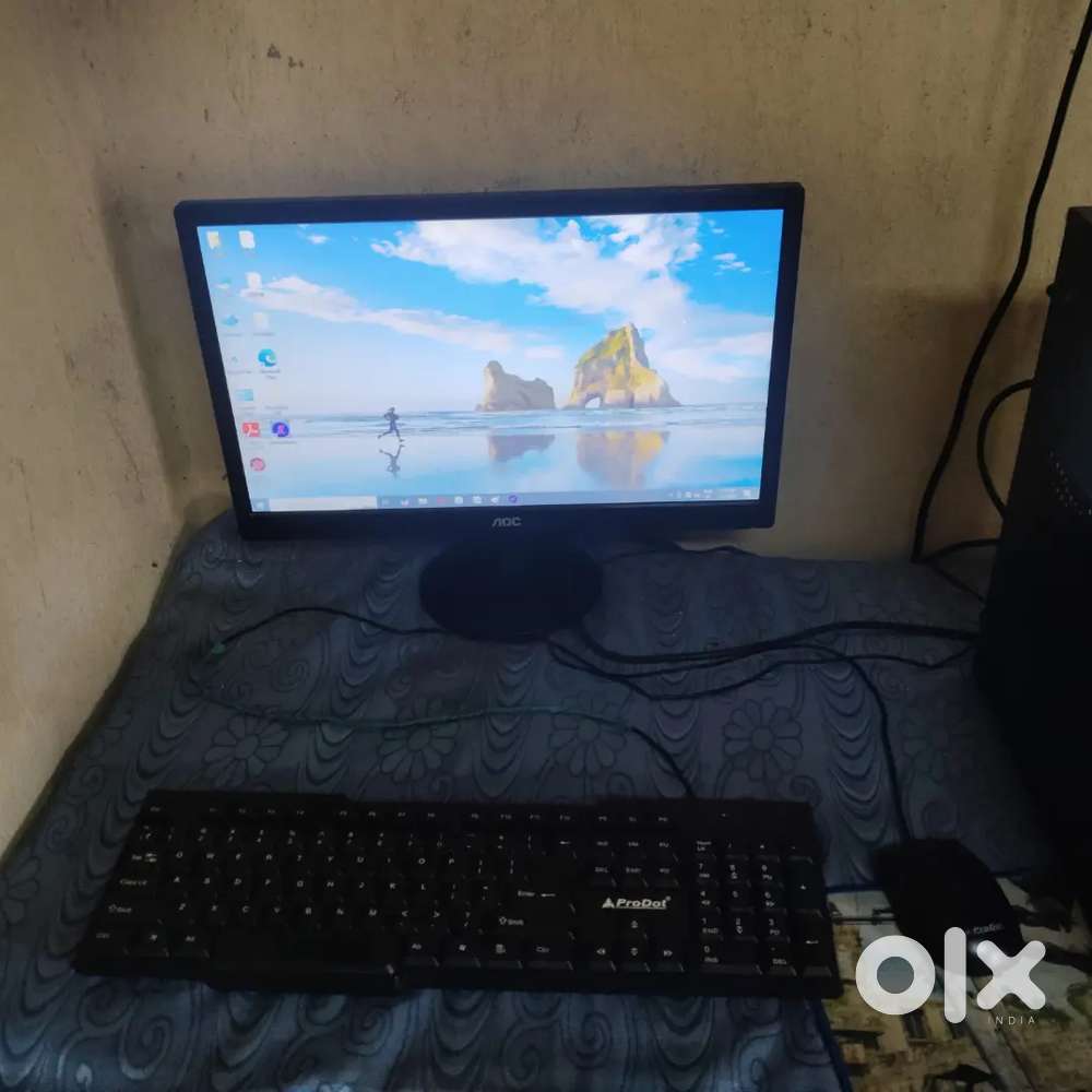 AOC 19 inch monitor and  i5 3rd gen..8gb ram...512 ssd .. and table