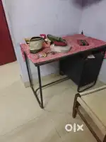 Godrej table with glass on top
