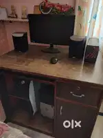 Computer table with revolving chair