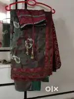Very beautiful Half n half olive green n mehroon net saree