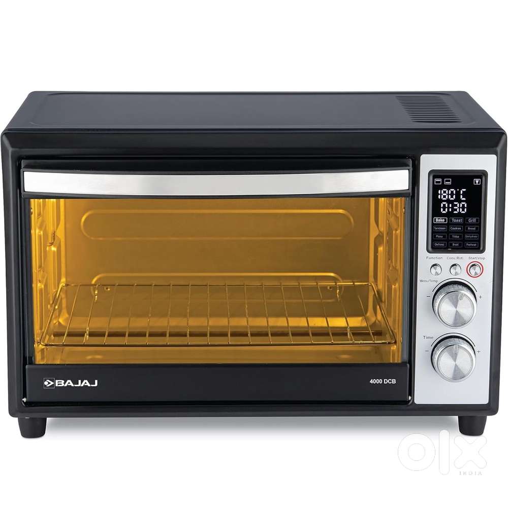 With storage stand Under Warrenty Bajaj Hybrid Oven 36L - one year old