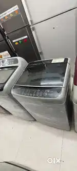 LG washing machine fully automatic top load with warranty and good con