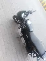Black and silver pulsar 125