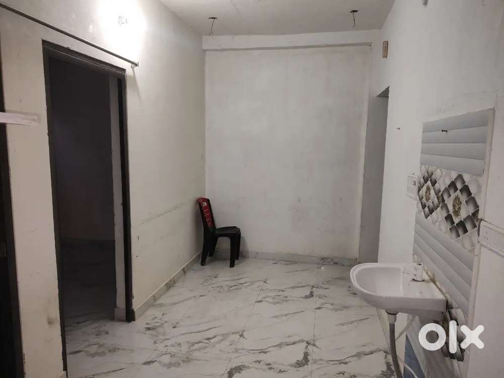 2 bhk flat at affordable price with white interior.