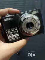Nikon digital camera (with rechargable battery and 4gb memory card)