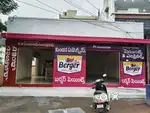 Lady computer operator in paint shop Gorantla, Guntur..