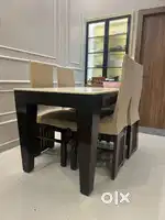 Dining table with marble top