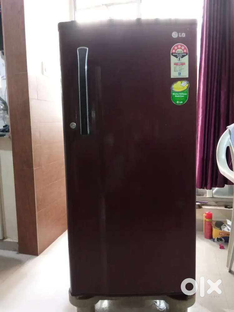 LG Refrigerator with stand, wooden computer table for sale