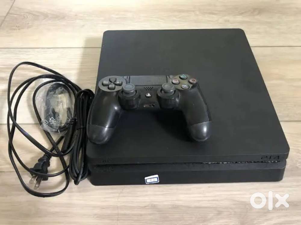 Ps4 slim 1tb in excellent condition with cable and remote