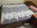 Sturdy wooden bed with modern design, spacious storage and premium
